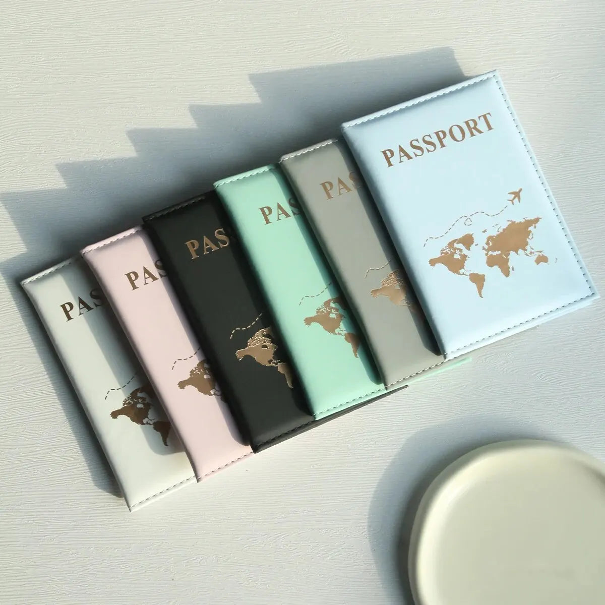 Funda para pasaporte con diseño de mapa del mundo, organizador y protector para tarjetas, documentos de identidad y tarjetas de crédito.